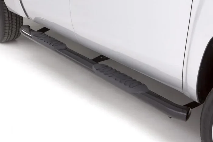 Lund 09-17 Dodge Ram 1500 Quad Cab 4in. Oval Curved Steel Nerf Bars – Black