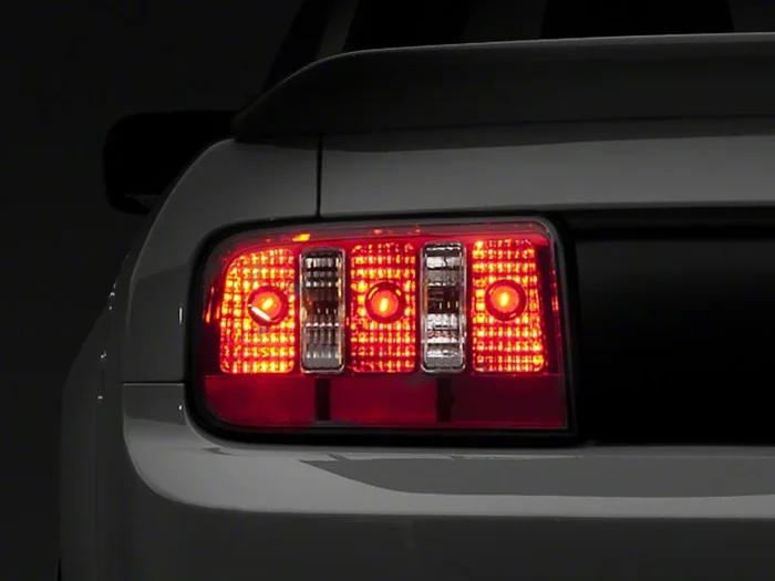 Raxiom 05-09 Ford Mustang Coyote Tail Lights- Chrome Housing – Red/Clear Lens