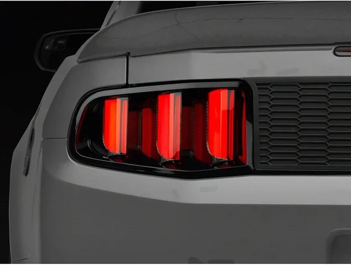 Raxiom 10-12 Ford Mustang Vector V2 LED Tail Lights – Gloss Black Housing (Clear Lens)